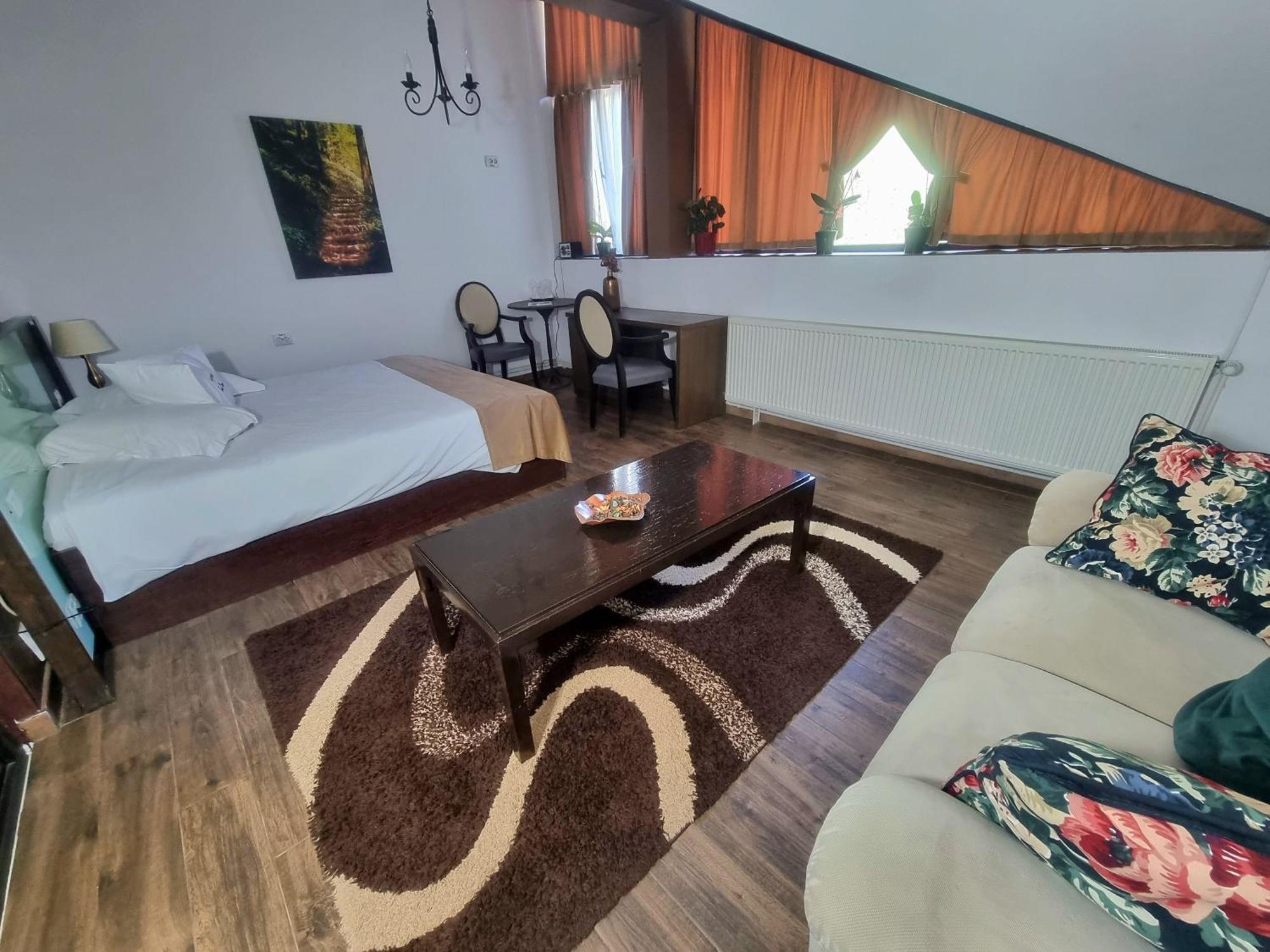 Pensiunea Tobo Baia de Fier Habitación foto